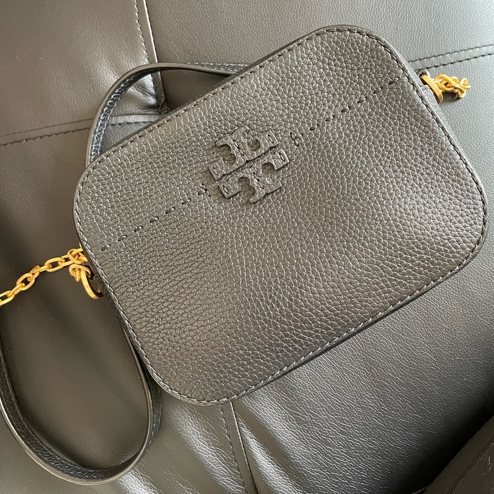 100% Authentic. Black leather with gold chain crossbody. Comes with bag cover
